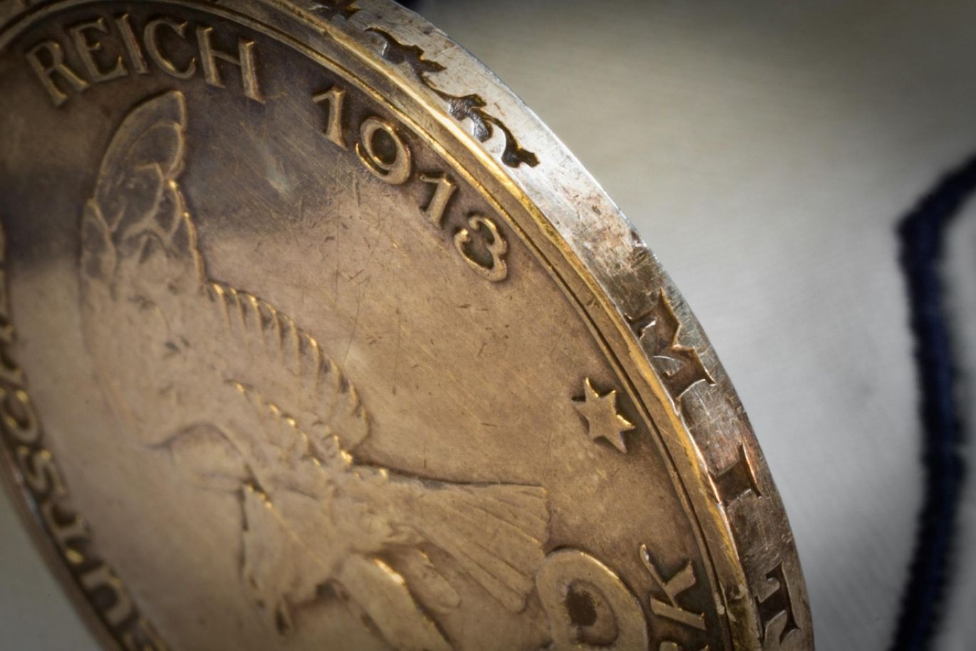A close-up of a 1 Oz Silver Bullion coin, representing a secure investment.