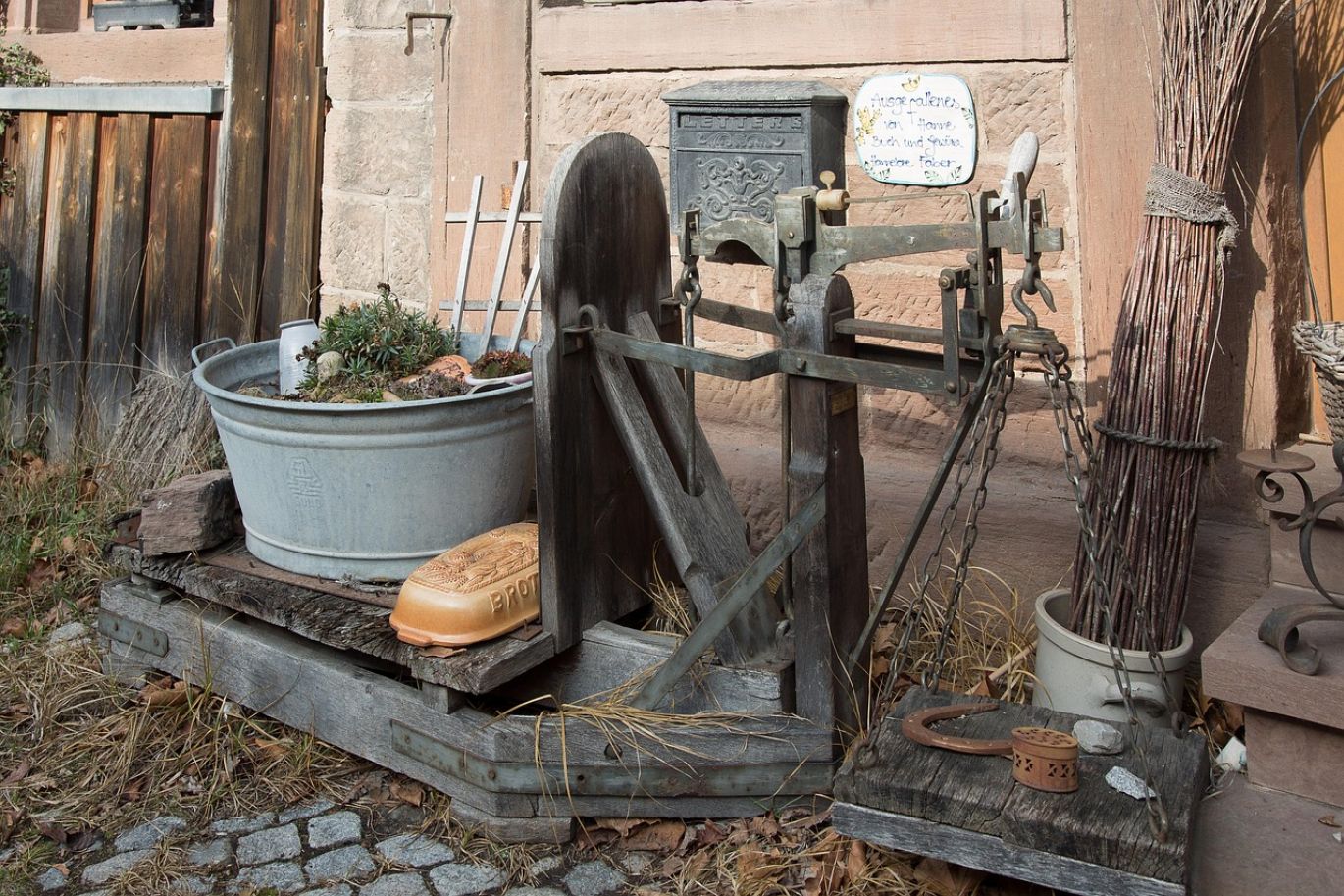 Scales weighing gold scrap with a focus on 9 Carat Gold Scrap Price valuation.