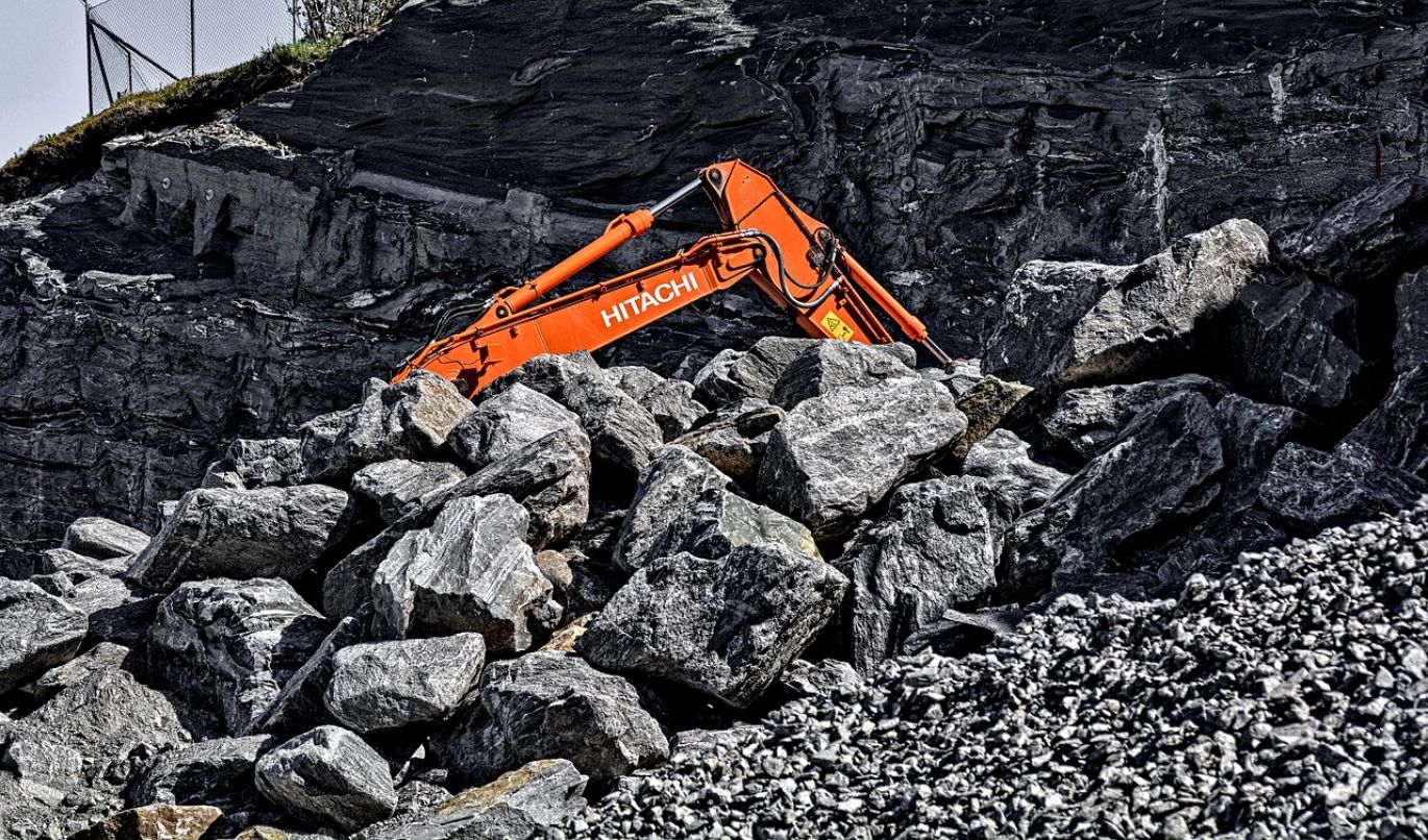 Addcar Highwall Mining operations showcasing efficient extraction equipment and trained personnel working on a highwall.