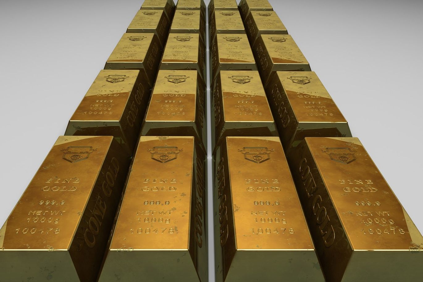 American Hartford Gold Group displaying investment-grade gold bars, symbolizing wealth preservation and financial security.