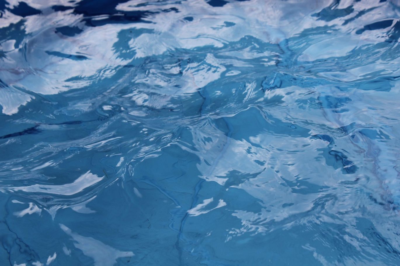 Close-up of a pool water test kit with Ash For Pools packaging nearby, illustrating Ash For Pools for balanced pool water