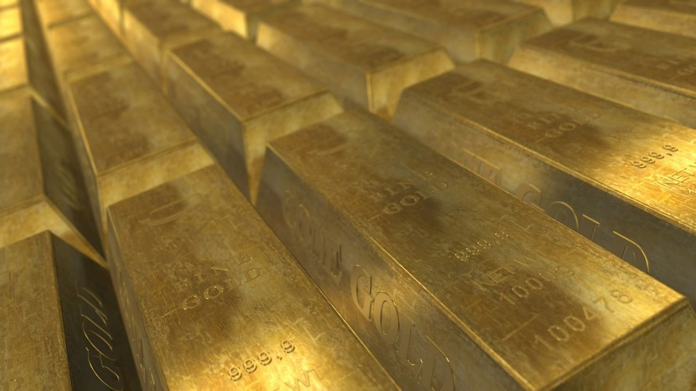 Gold bars representing the best gold stocks list for investment.