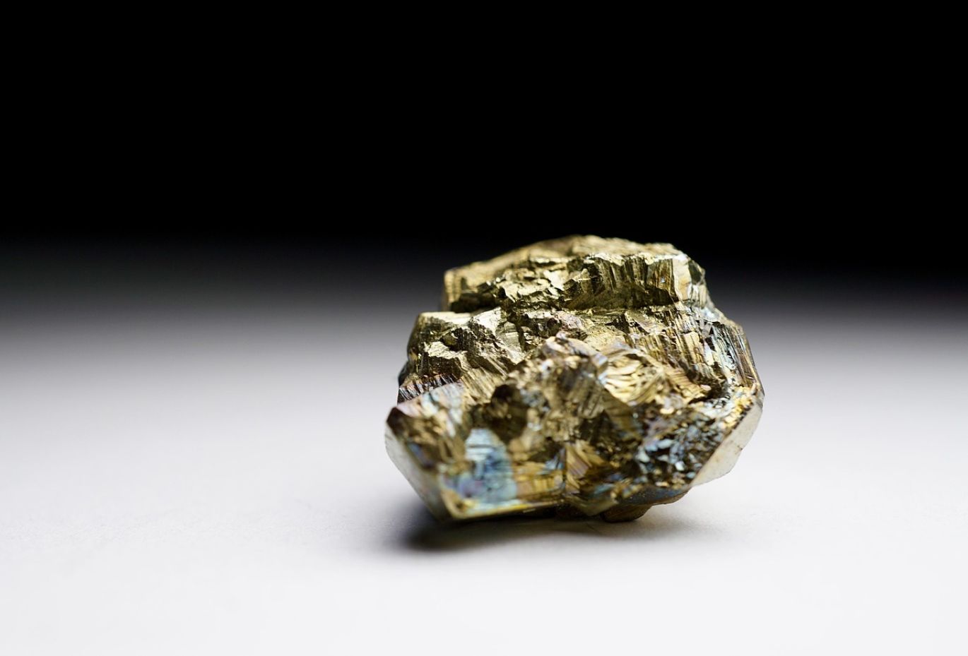 A collection of assorted polished bulk gems and crystals for industrial use, showcasing vibrant colors and clarity.
