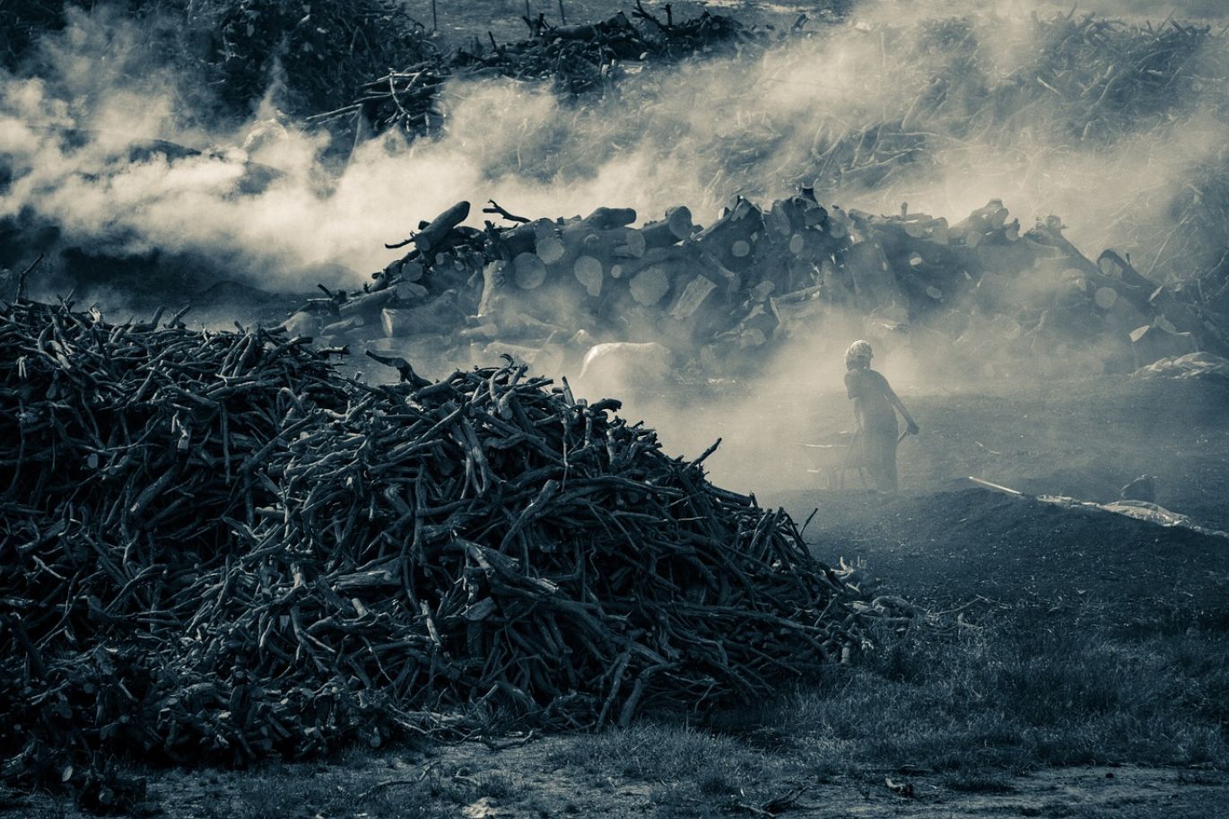 Historical image depicting coal mining in the 1800s with miners and equipment