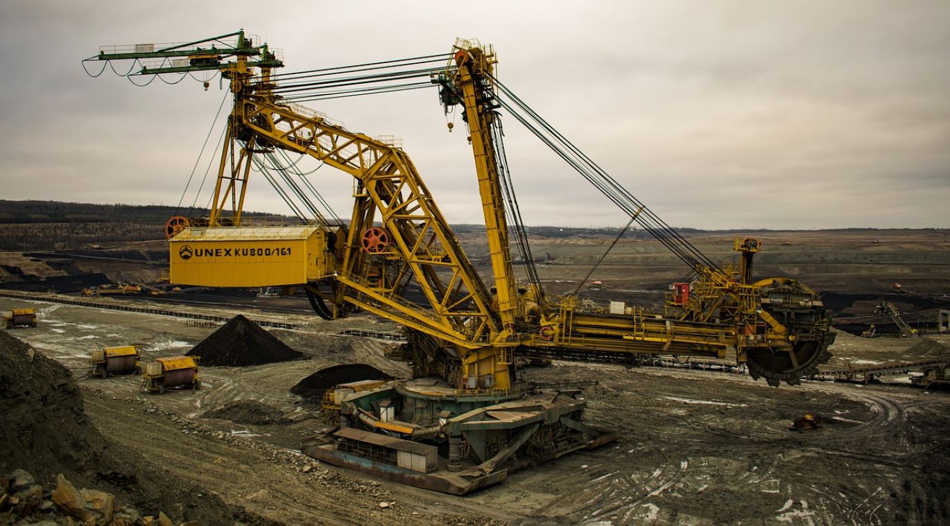 Coal mining operations showing industrial scale extraction and logistics