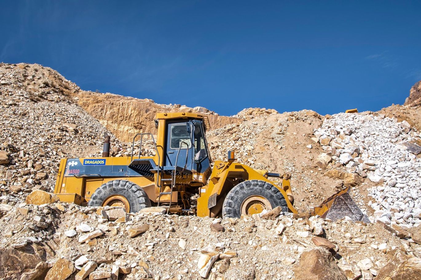 Miner holding cobalt ore, representing Cobalt Companies To Invest In, with Maiyam Group's ethical sourcing in Kenya.