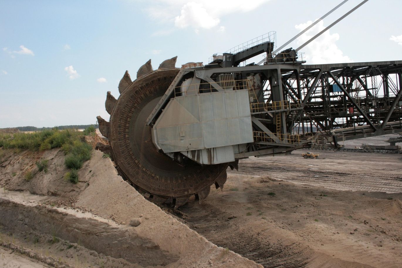 Large dragline excavator performing earthmoving operations in a Kenyan mine for mineral extraction.