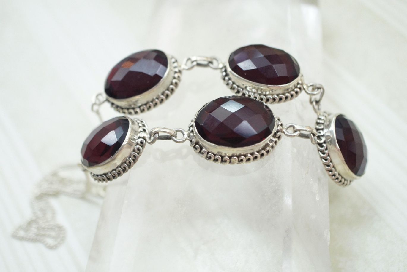 Collection of faceted gemstones wholesale, showcasing vibrant colors and brilliant cuts