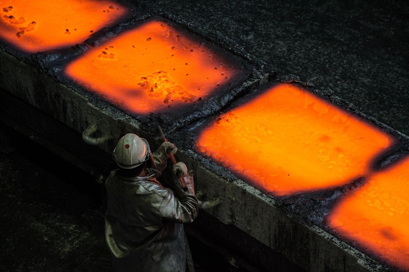 Industrial furnace used in the Ferro Molybdenum Manufacturing Process, showcasing the high-temperature smelting of