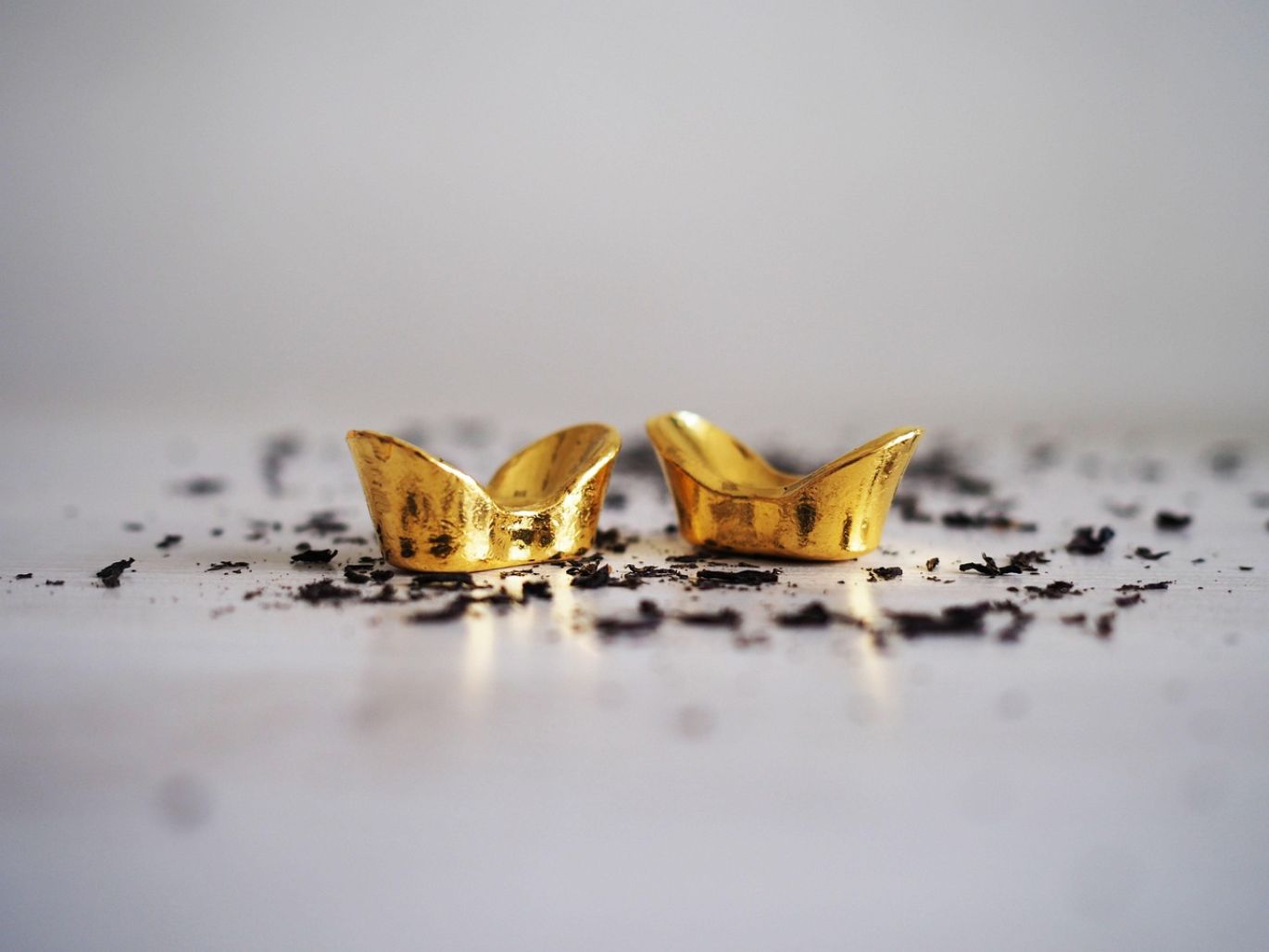 Close-up of shiny gold bullion bars, representing the opportunity to find bullion with Maiyam Group.