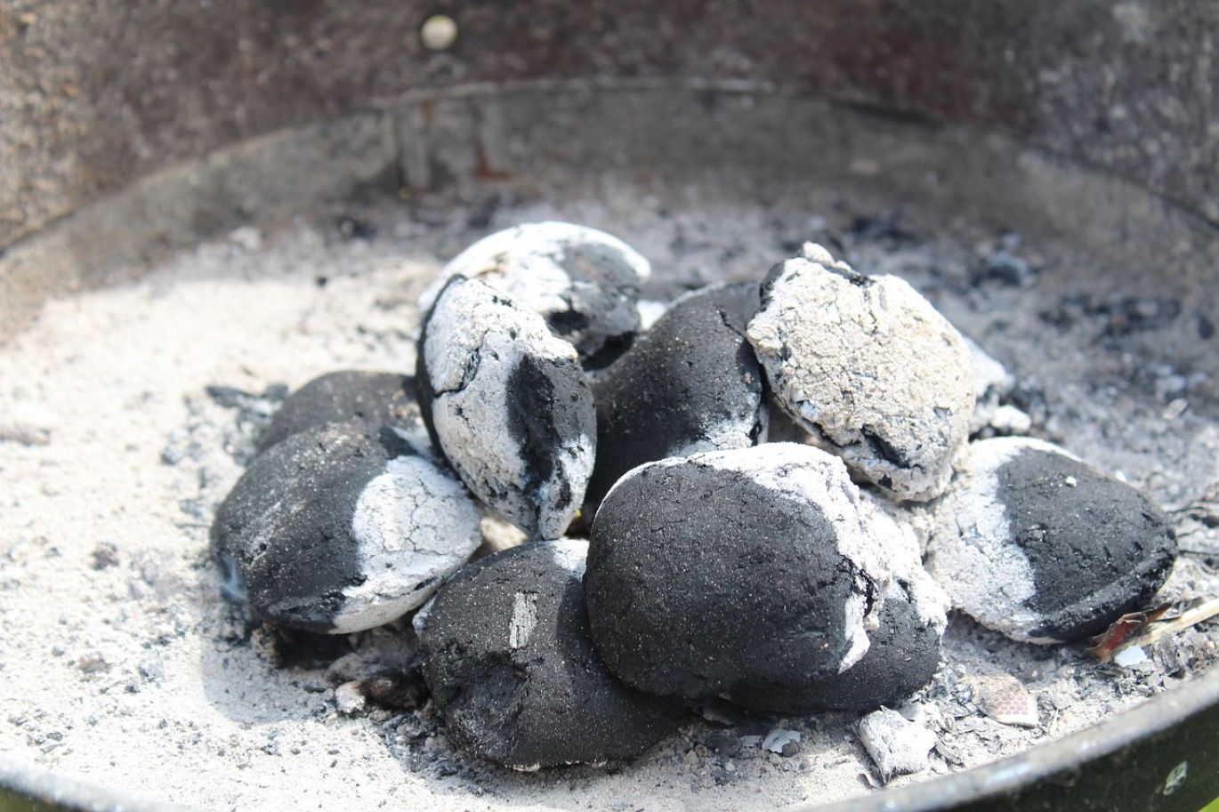 Pile of high-quality Fluorspar Briquettes ready for industrial use, supplied by Maiyam Group.