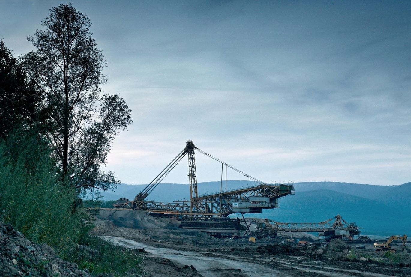Illustration of gold mining operations highlighting Freeport Mcmoran gold production and Maiyam Group's role in sourcing.