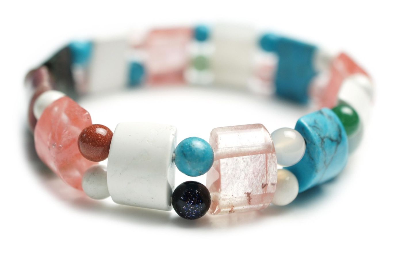 Close-up of colorful gemstone chip beads arranged for wholesale purchase, highlighting variety and quality of Gemstone Chip