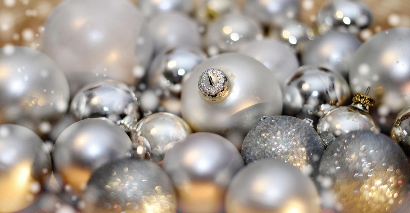 Gold bars and silver coins representing Gold And Silver Today market insights