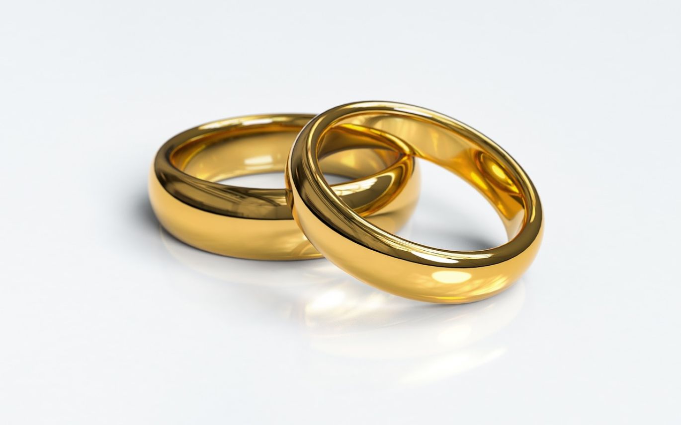 Close-up of raw gold nuggets and jewelry making tools, representing Gold Jewelry Making Supplies Wholesale