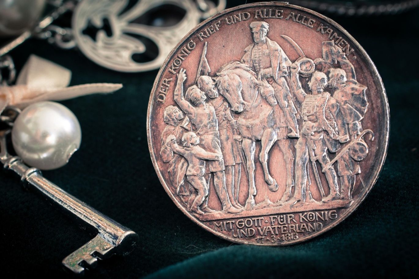 Close-up of silver bars and coins, symbolizing Investing In Silver and portfolio diversification.