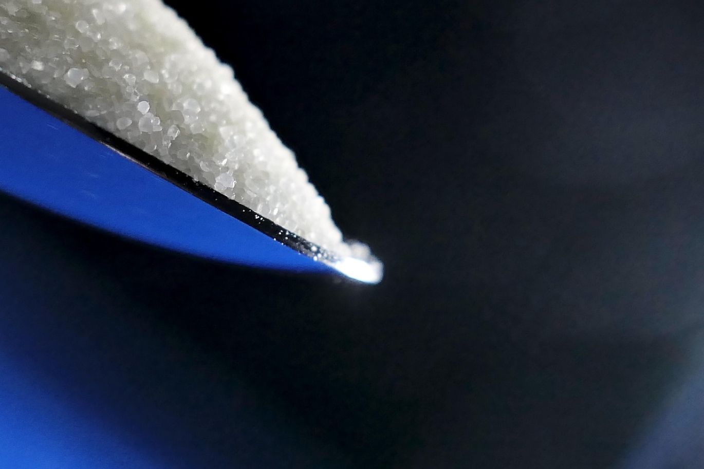 Close-up of Magnesium Chloride Soluble crystals, highlighting purity and industrial application potential.