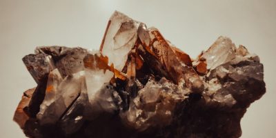 Miner holding magnesium ore samples from Kenya, representing Maiyam Group's Magnesium Suppliers