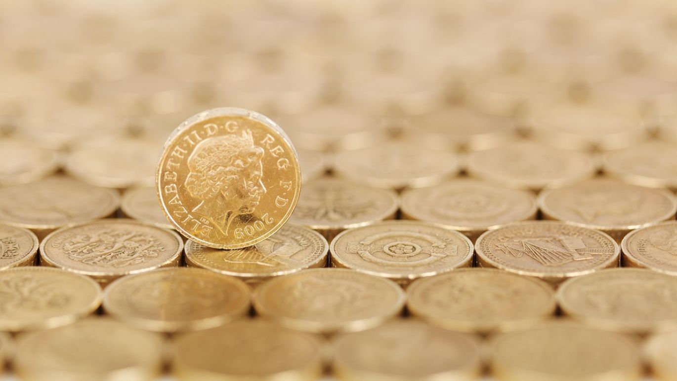 Mcx Gold Silver Price - Close-up of gold and silver coins reflecting market values