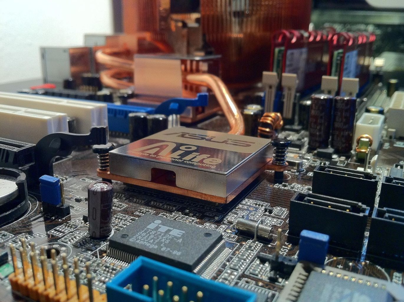 Close-up of mica sheets used as insulators in electronic components.