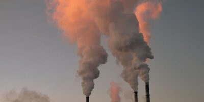 Nickel ore with industrial background, symbolizing its use in manufacturing and batteries - Maiyam Group