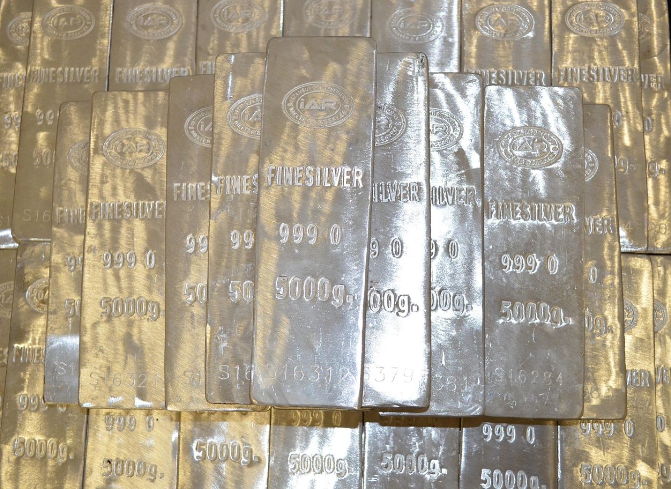 Gold and silver bars representing Precious Metals And Mining Trust services offered by Maiyam Group