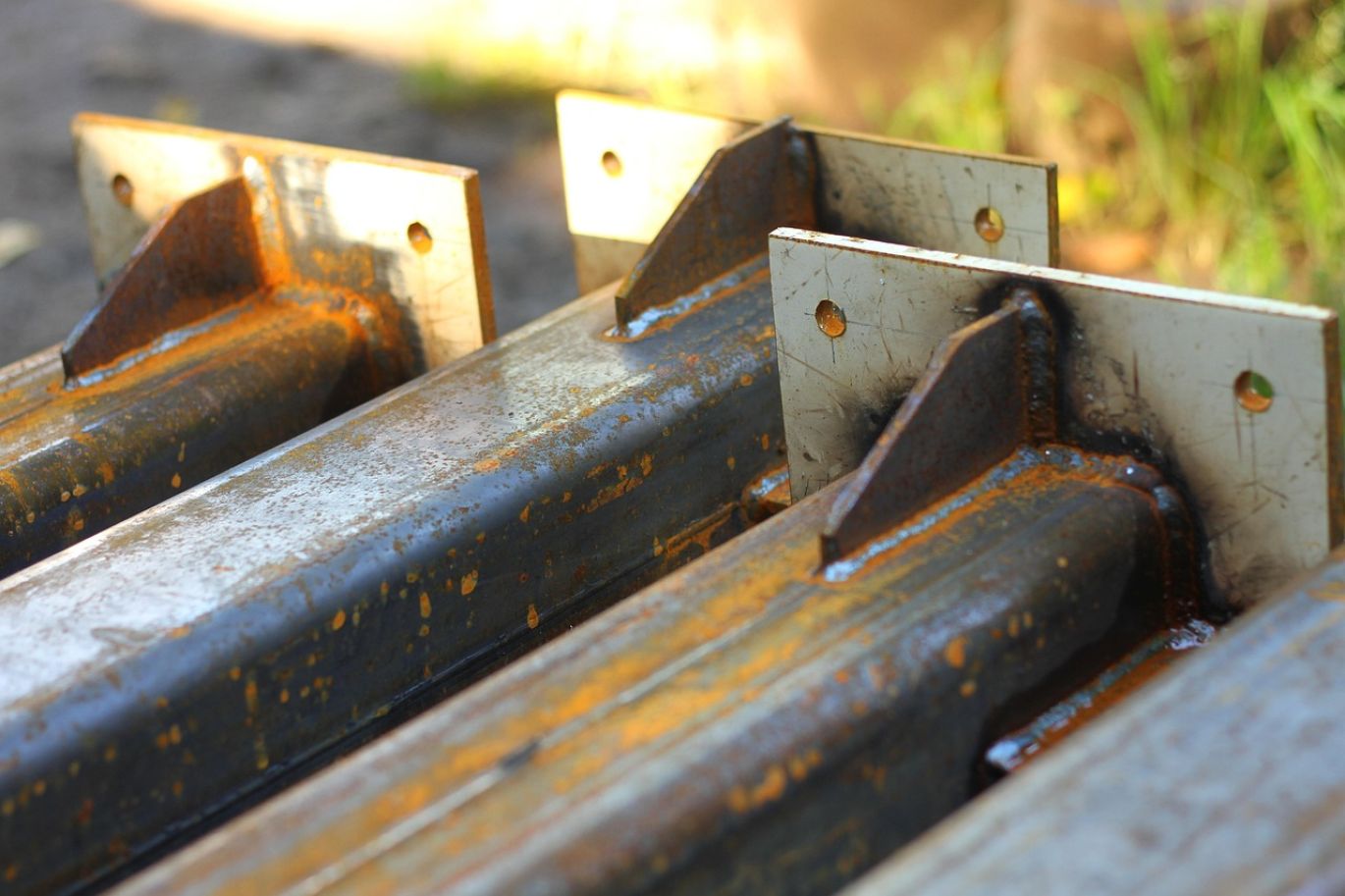 Production Of Steel From Iron Ore: Workers mining high-quality iron ore, essential for steel manufacturing.