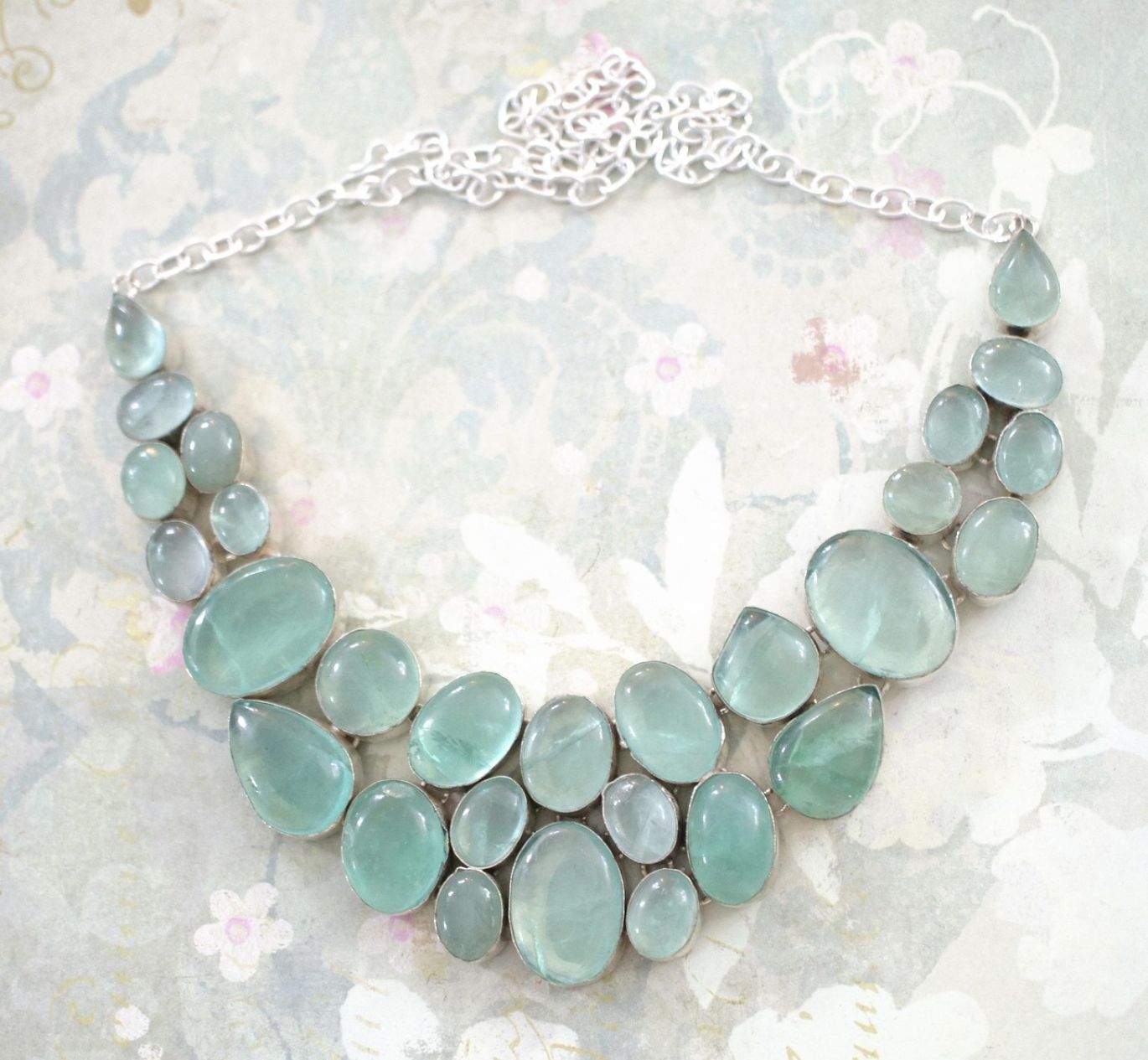Expert appraising scrap sterling silver for its price