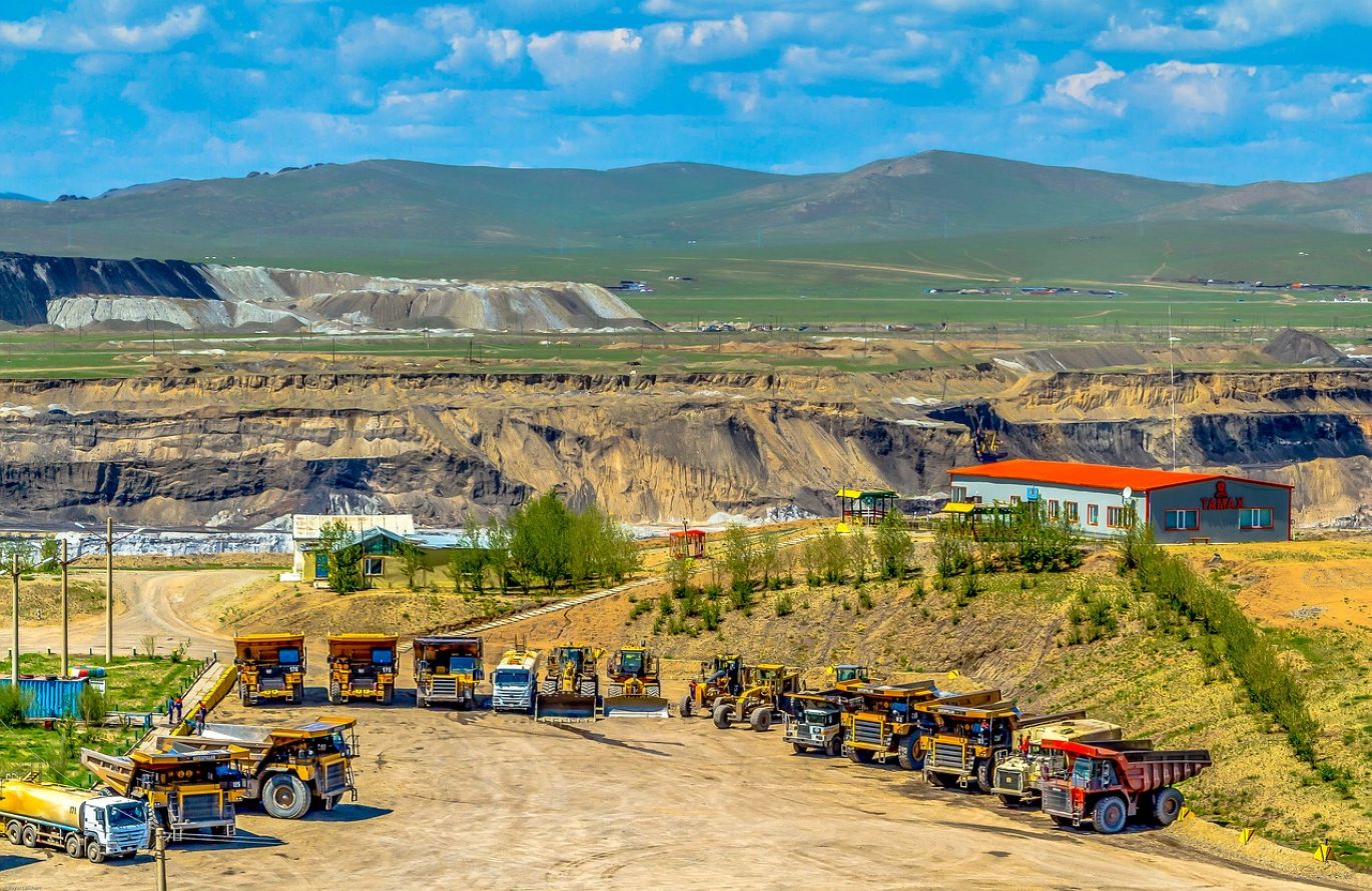 Shares In Lithium Mining Companies - illustration of lithium extraction and battery components.