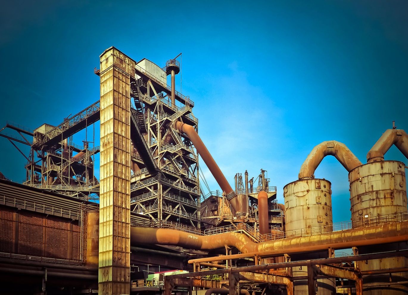 Industrial setting demonstrating Soda Ash Blasting equipment and process for effective cleaning.