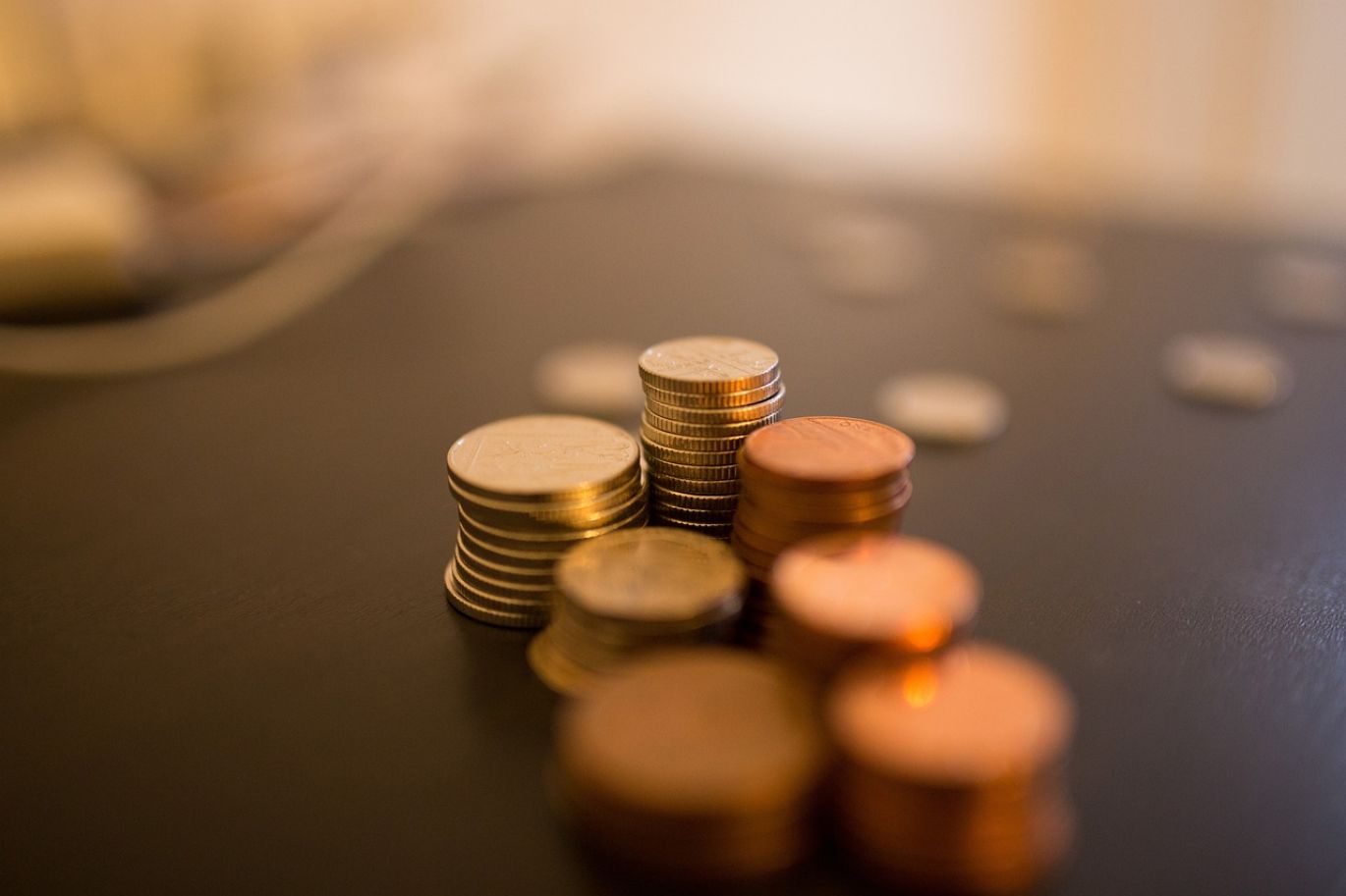 A stack of Sprott Silver Coins representing investment security and value.