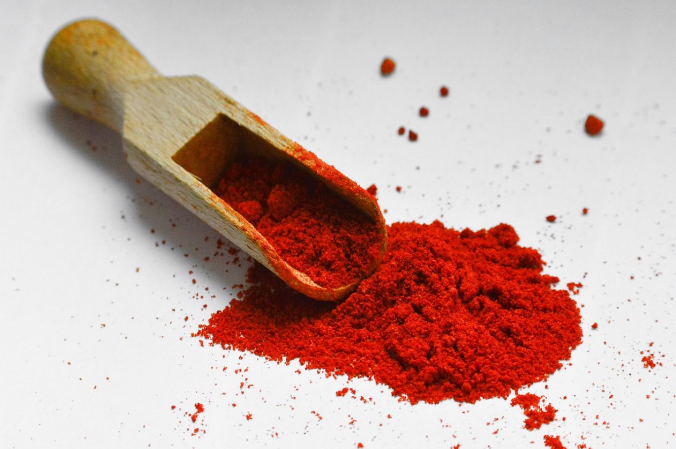 Close-up of food-grade talc powder being used in a food production facility.