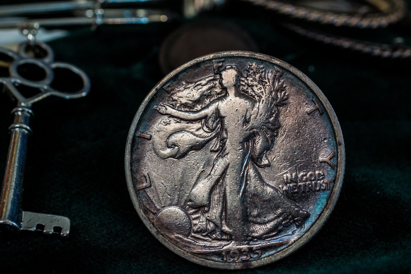 Close-up of Valuable Silver Dollars being assessed for quality by a Maiyam Group expert in Kenya.