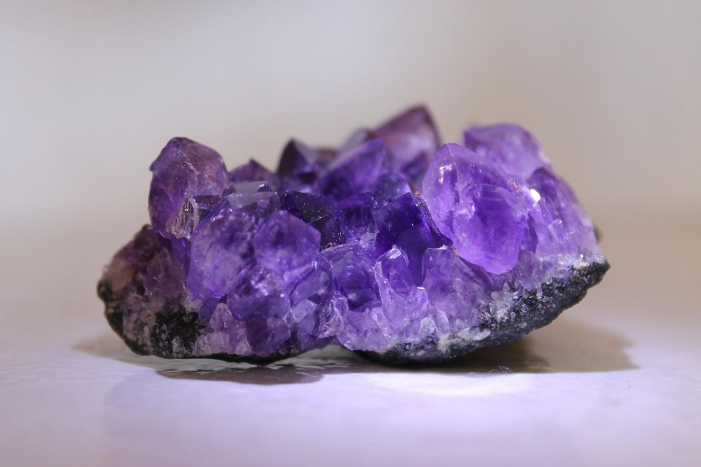 A collection of high-quality Wholesale Amethyst Stones, showcasing vibrant purple hues and excellent clarity.
